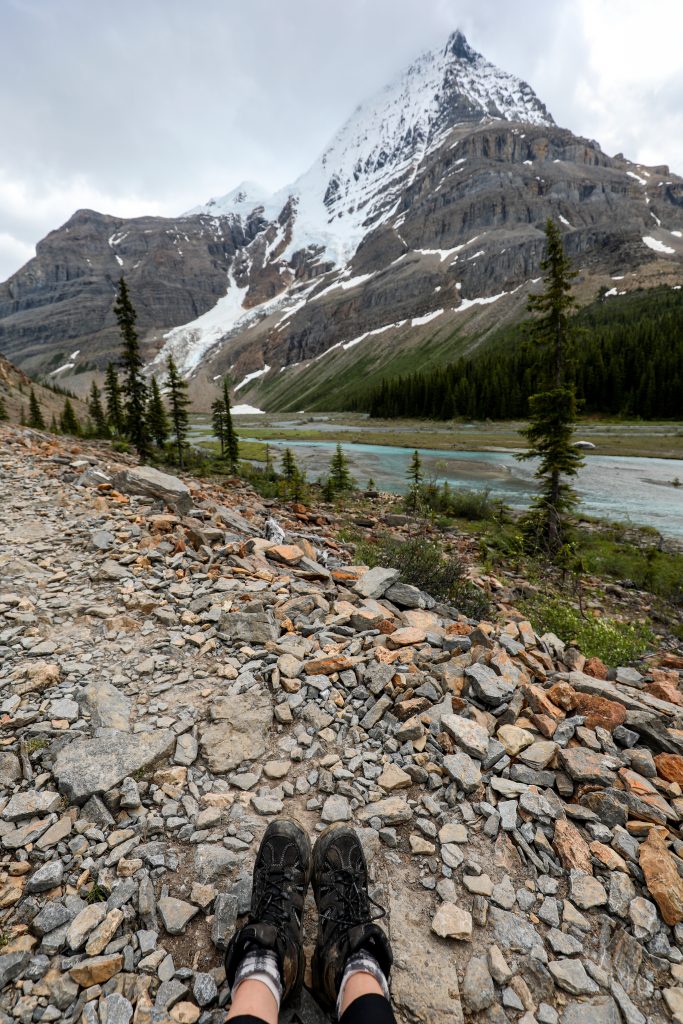 Hiking boots pictured along the rocky Berg Lake Trail at Mount Robson Provincial Park