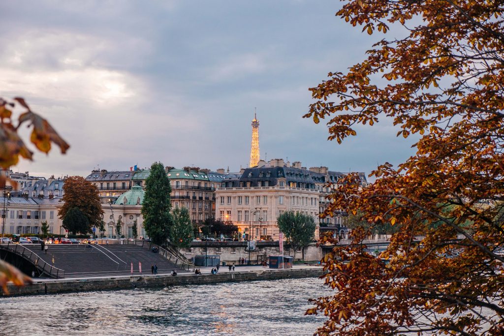 One of the best cities to live in Europe is Paris, France with the Eiffel Tower lit up.