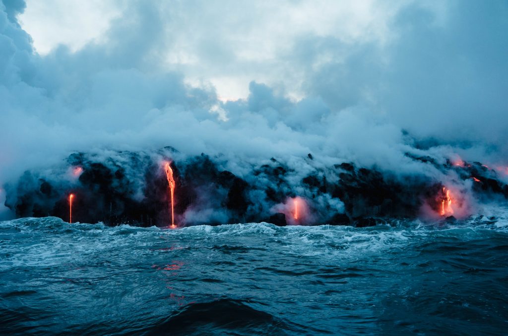 Lava oozing into the Pacific Ocean