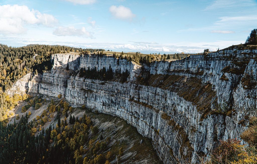 Creux du Van, the rocky cauldron, is one of the 7 most beautiful places in Switzerland.