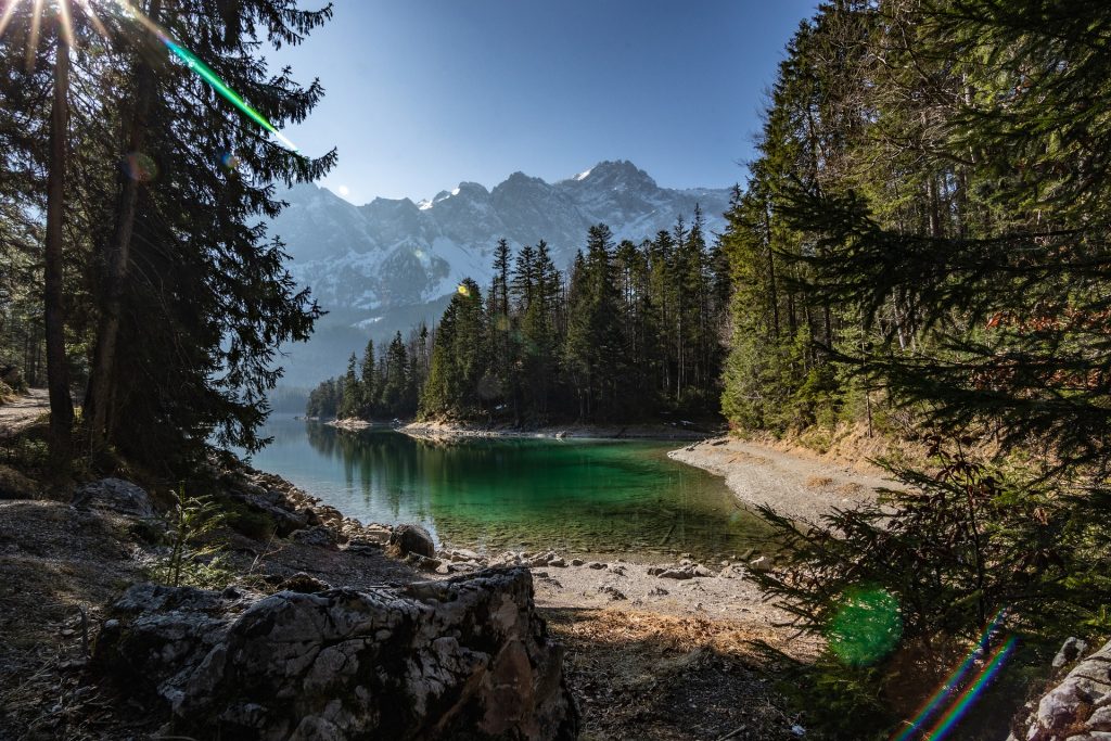 Experience the crystal clear waters of Eibsee on a SUP, on of the best destinations in Europe for the sport