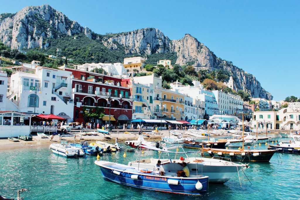 Capri Island is one of the best places to visit in Italy with blue seas and mountain views.