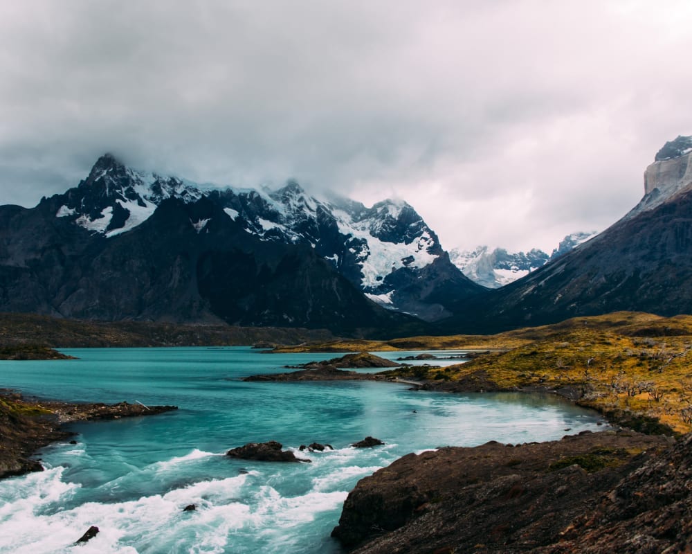 River and mountain in Patagonia one of the best travel movies and books