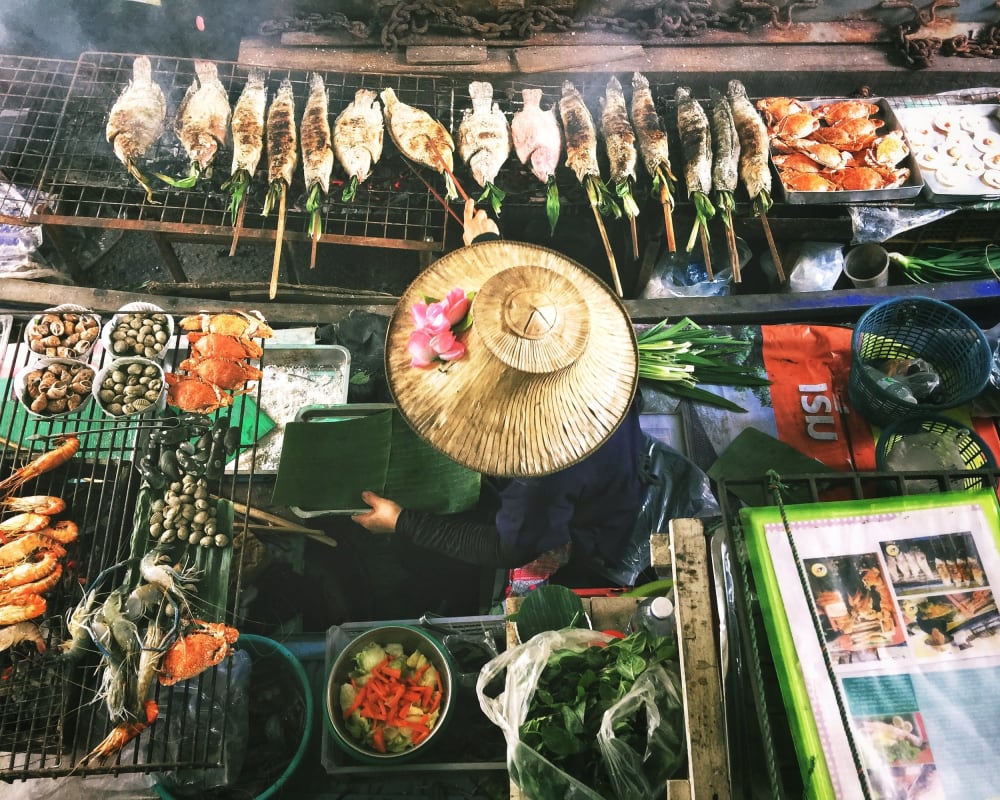 Woman on a street market one of the best travel movies and books