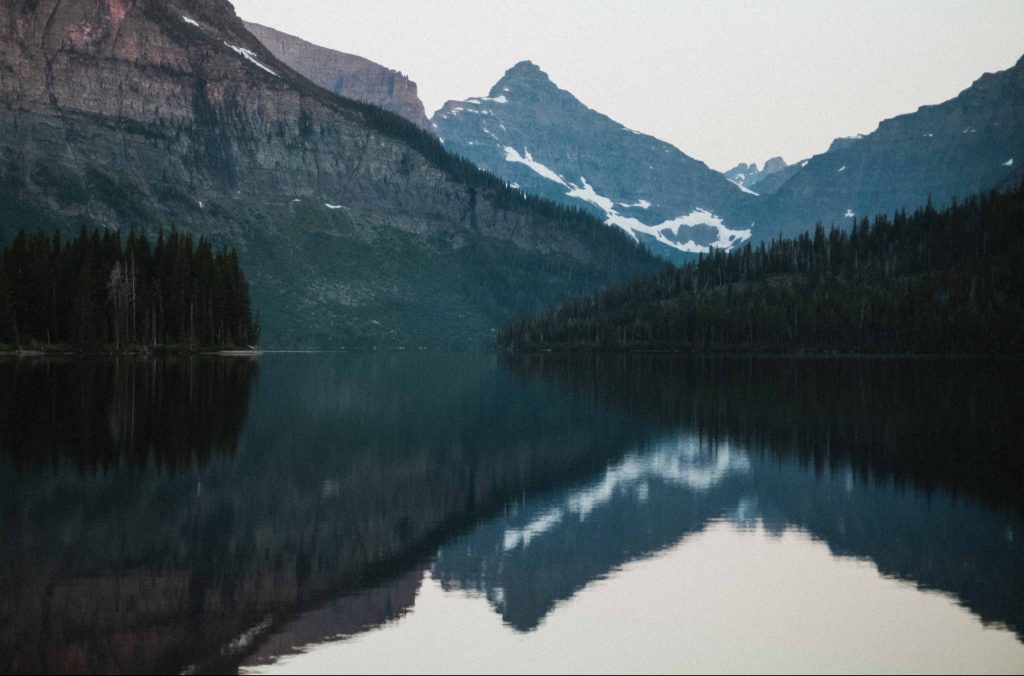 view of the Flathead lake, Montana in USA with mountains int he background.