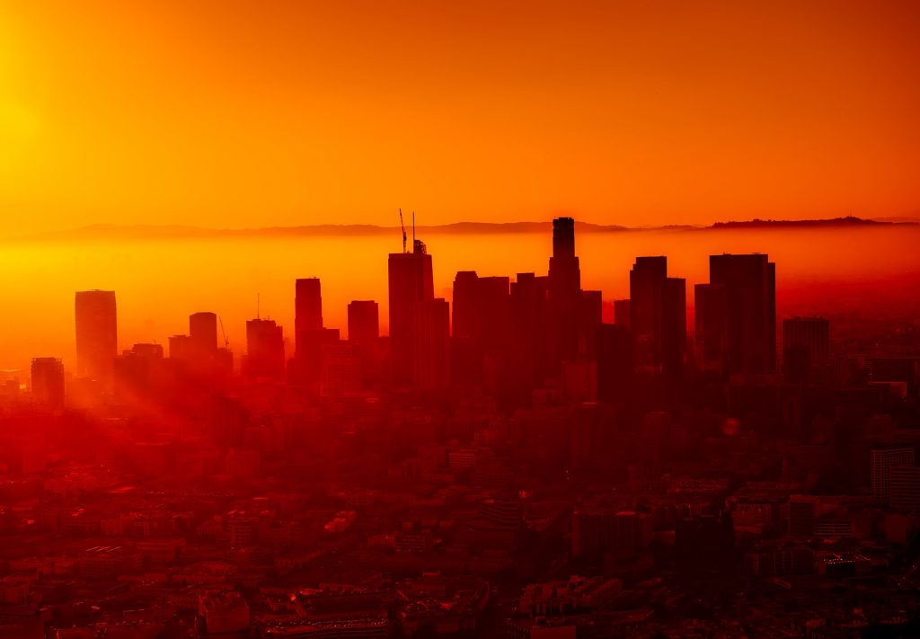 The city of Los Angeles in California in hazy sunset light