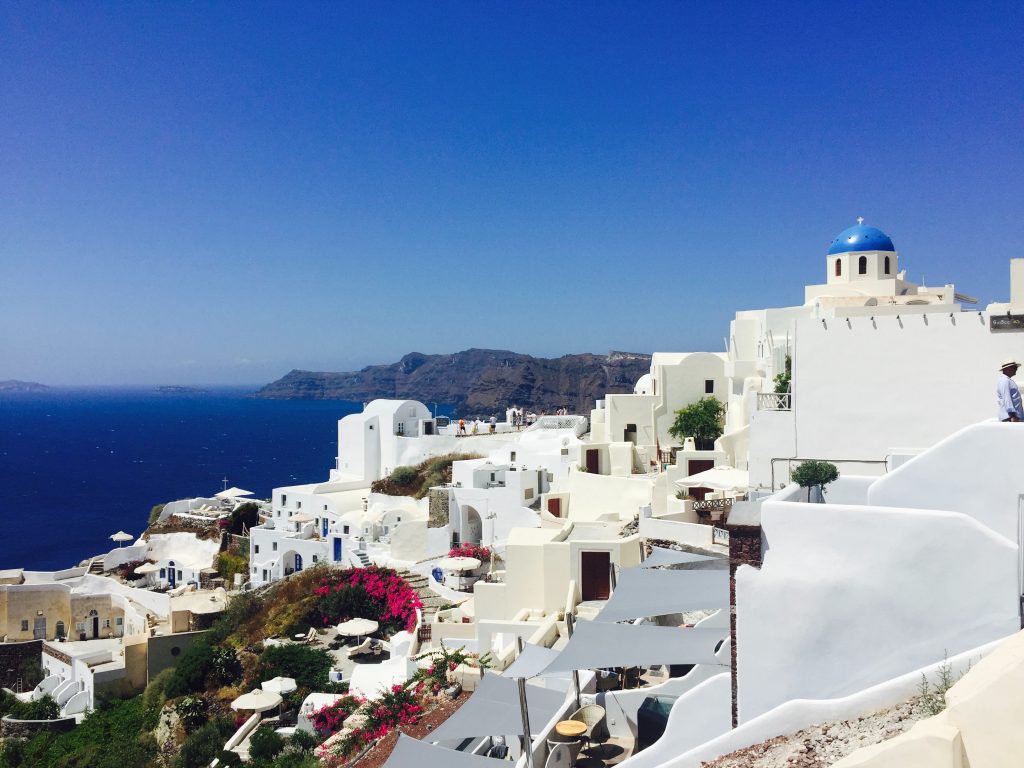 Germany has gone into strict lockdown in Santorini, Greece with white buildings and clear blue sky