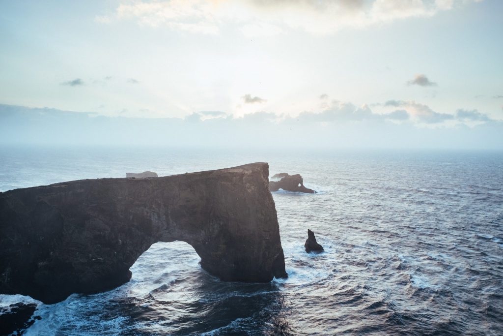 A huge rock formation in Iceland in a travel guide for Iceland.