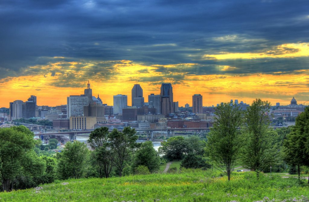 The best city to live in America is St.Paul in Minneapolis with the sun shining through the clouds