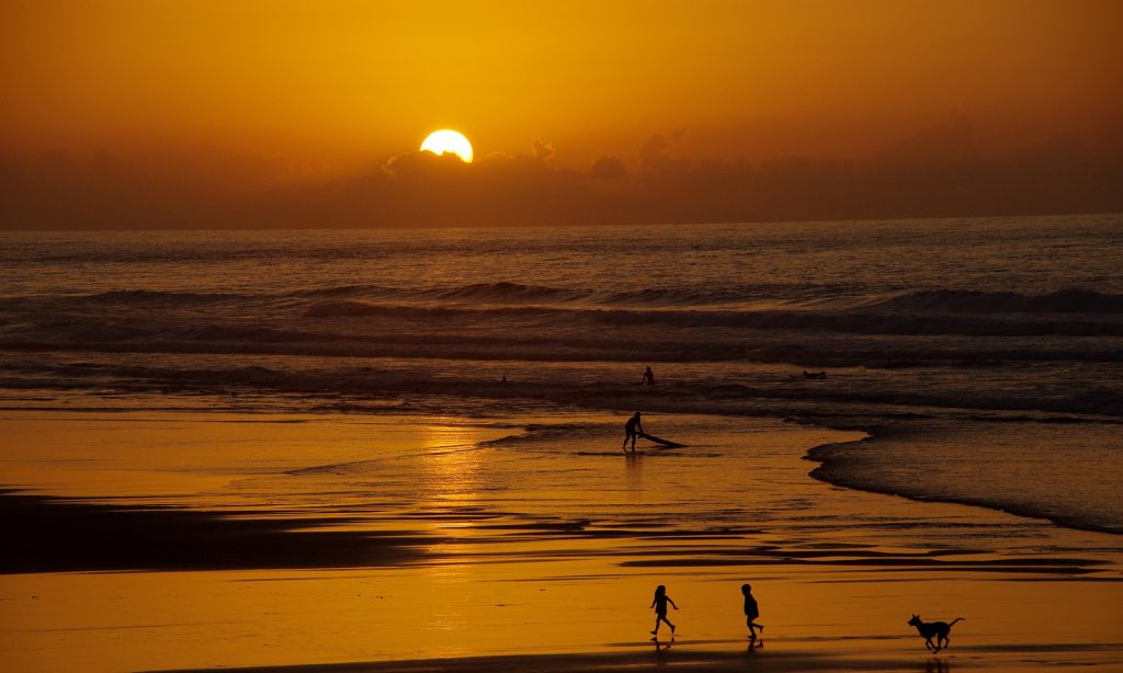 People at sunset on the beaches of Morocco 