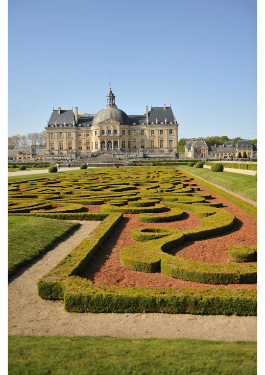 Manicured hedges in front of Chateau Vaux-le-Vicomte, France