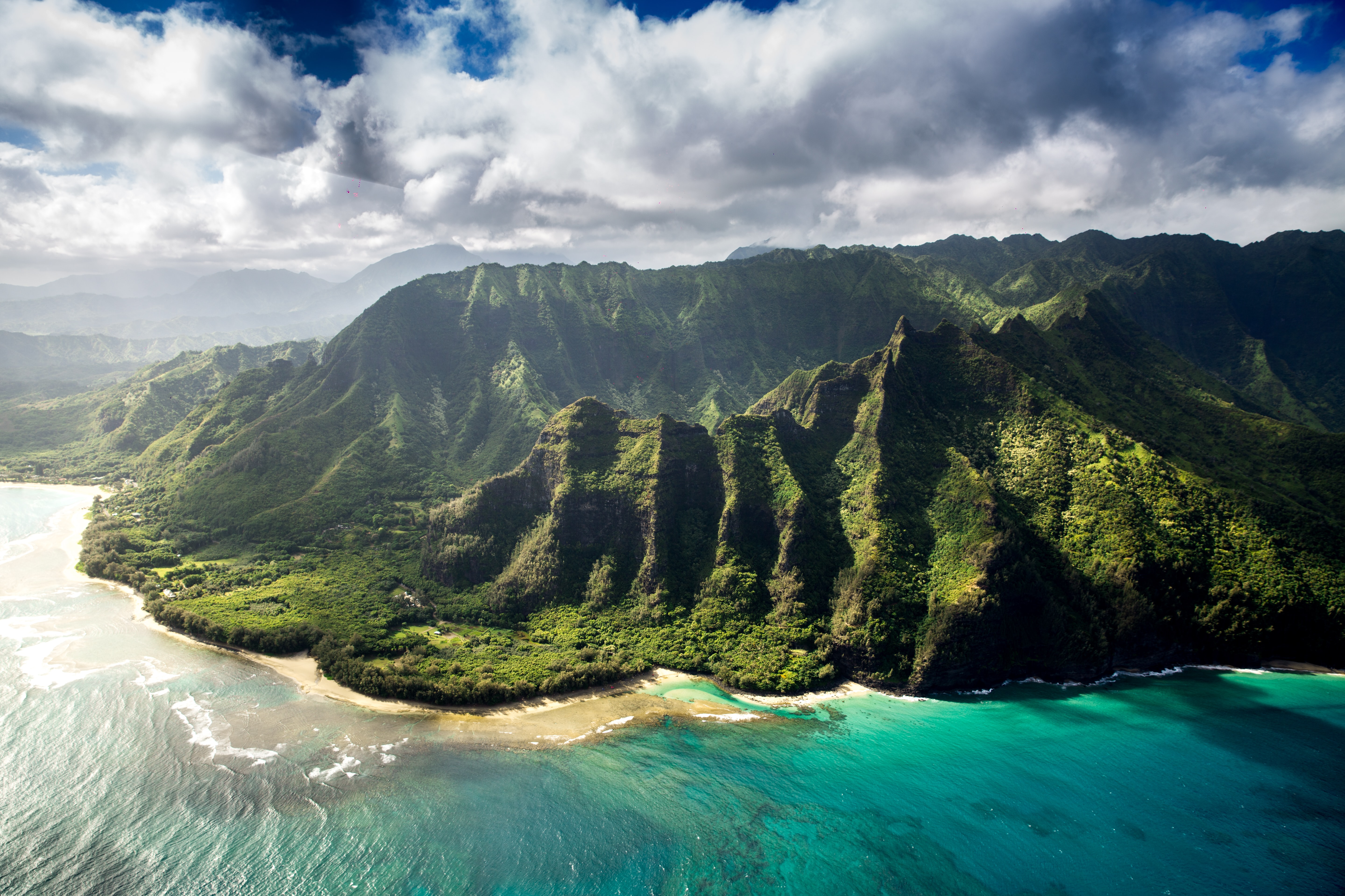 Lush green cliffs by the sea in Hawaii