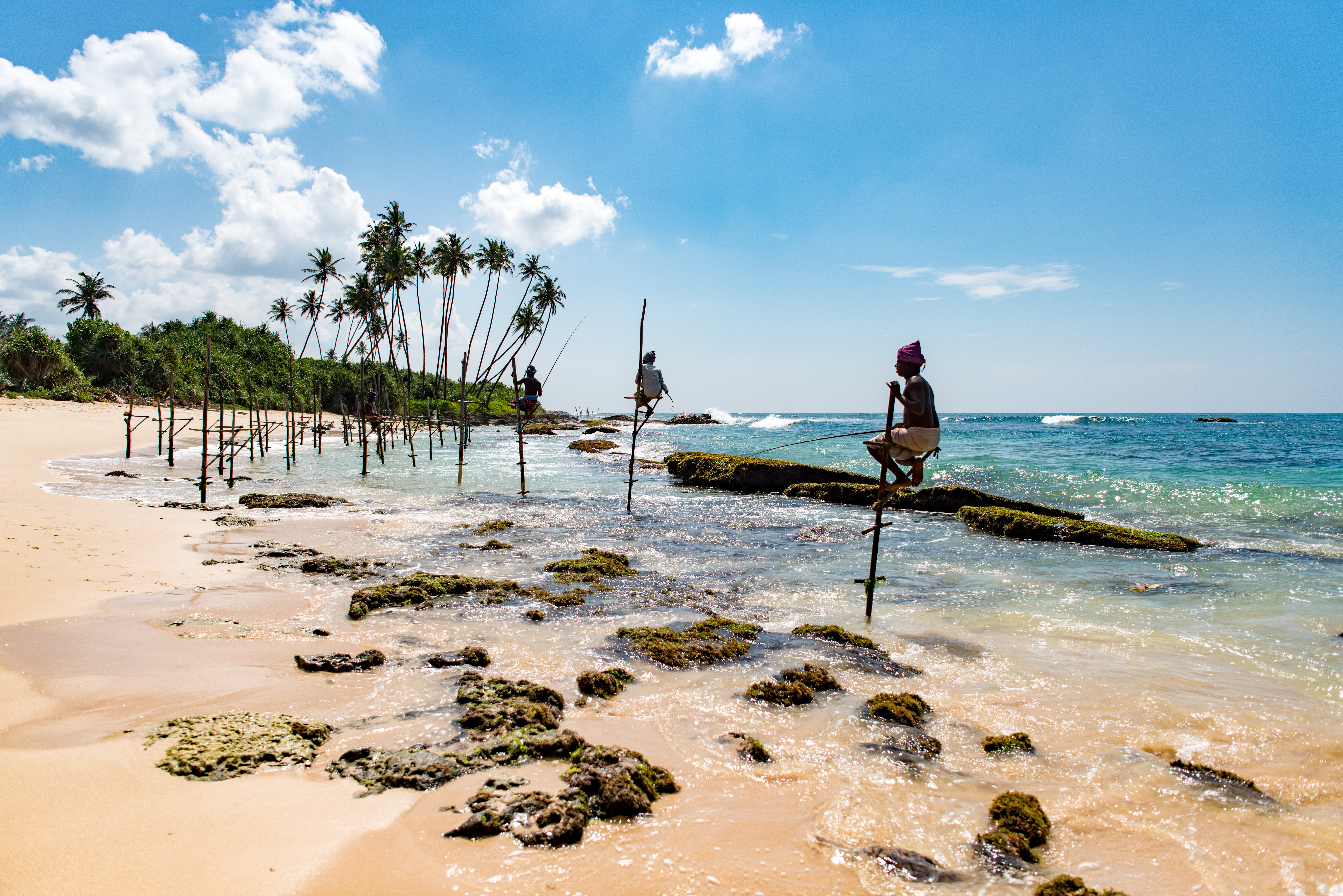 Sri lanka beach with crystal clear blue waters.