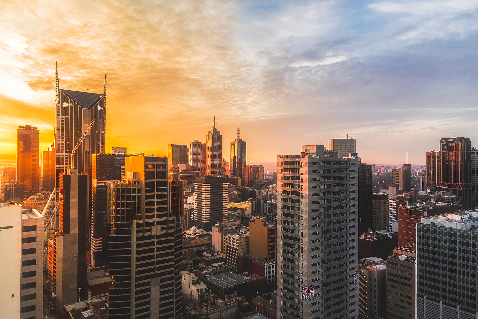 A city with skyscrapers at sunrise