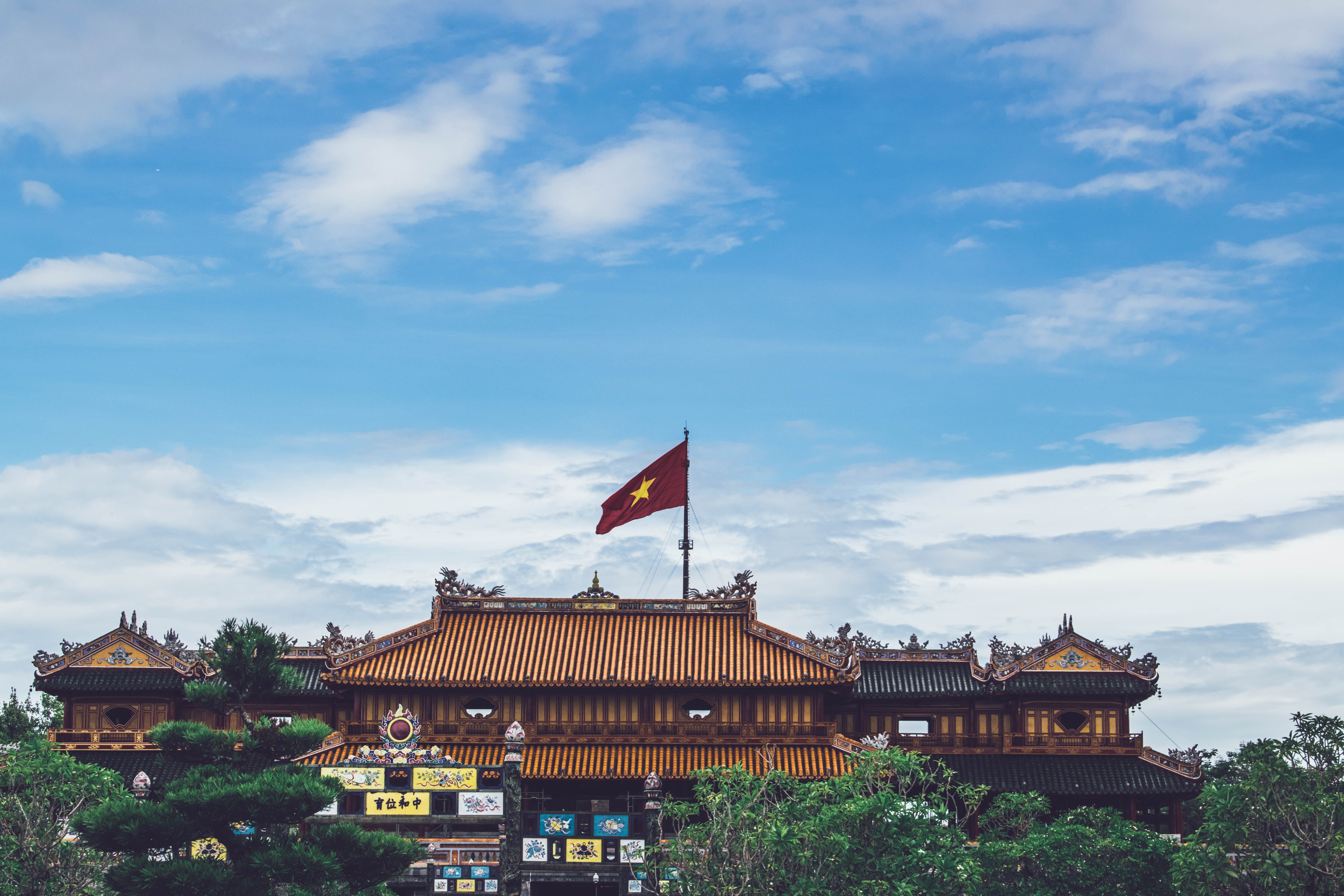 Hue, Vietnam with a building and blue skys.