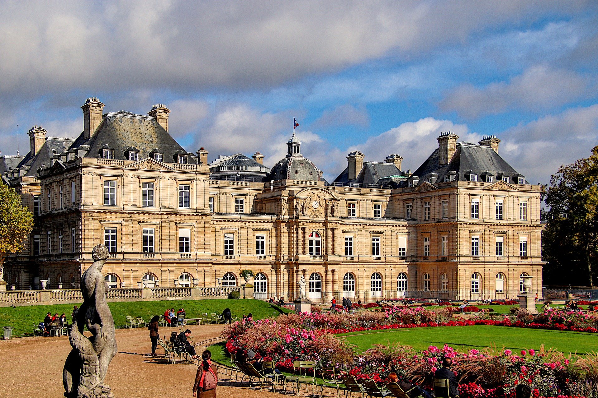 An old building surrounded by gardens in Paris