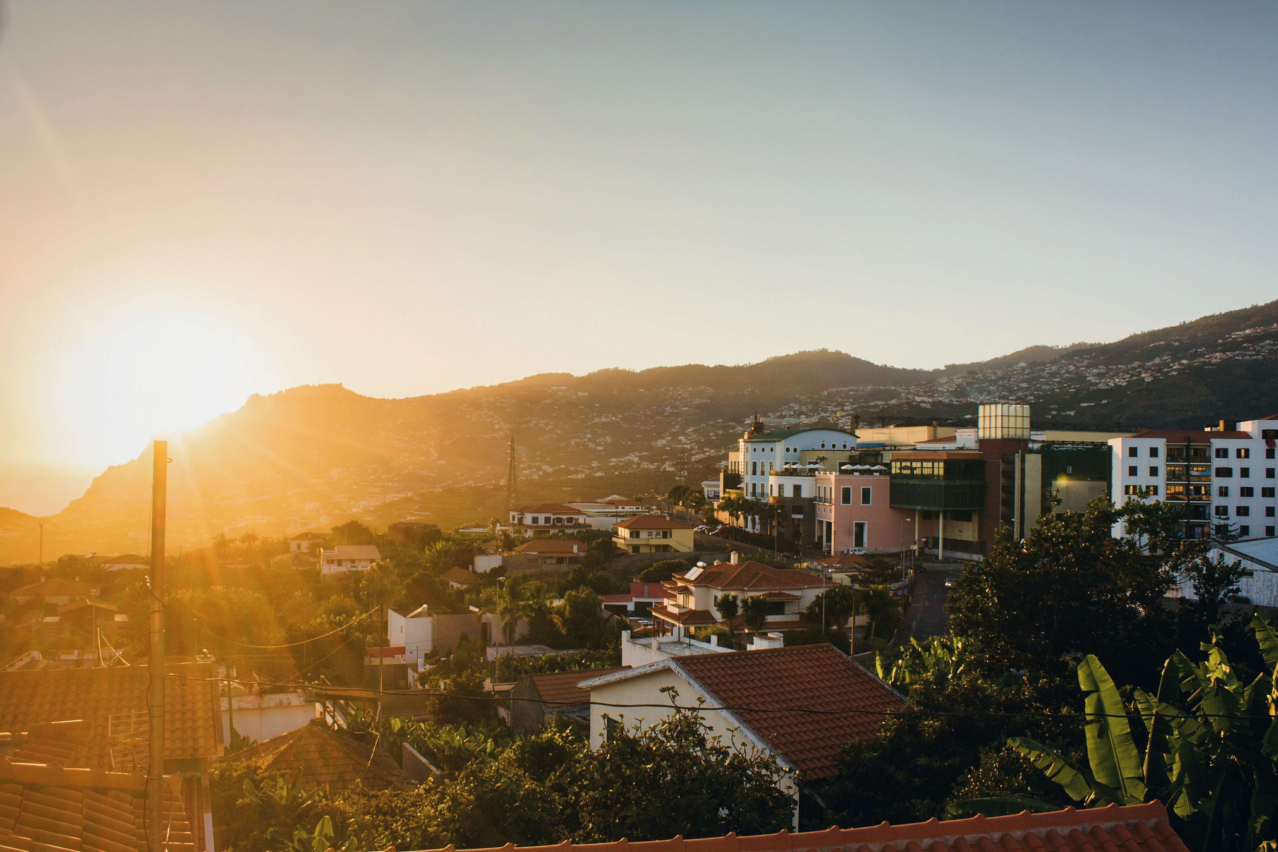 Sunset over the hills of Funchal.