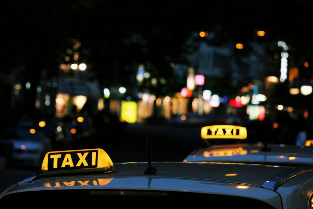 Taxis on the road in Vietnam a travel tip in Vietnam