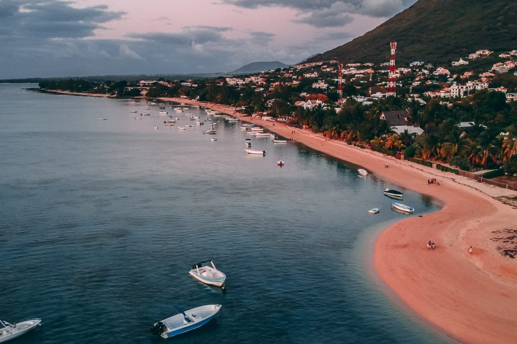 travel again to Mauritius: the coastline with a sandy beach and blue water