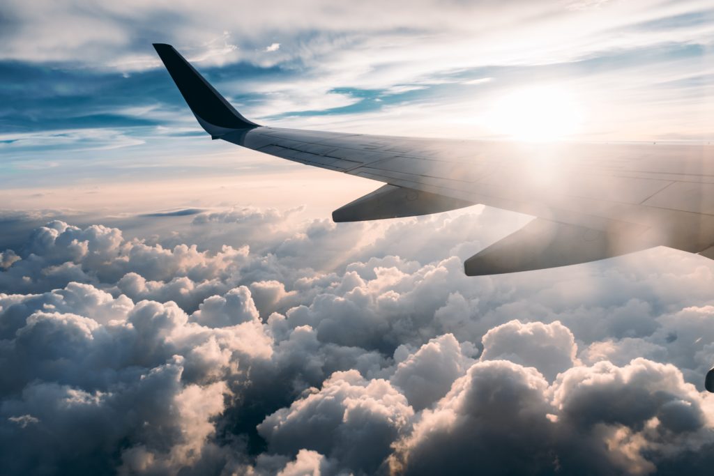 best travel apps a picture of a wing from a plane 