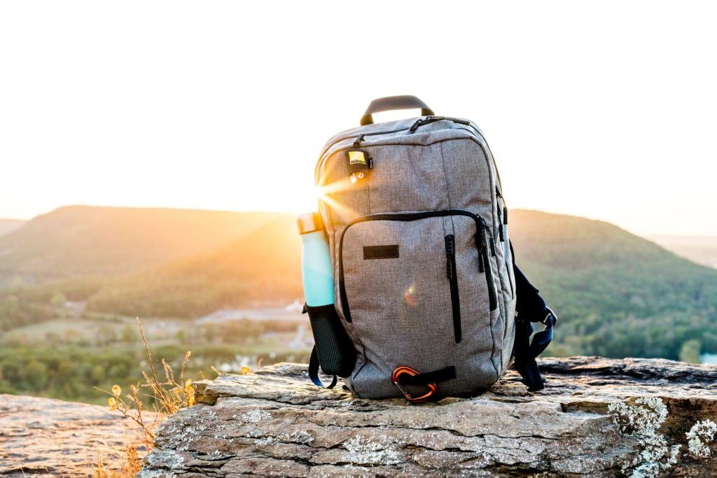 backpack on cliff in german countryside