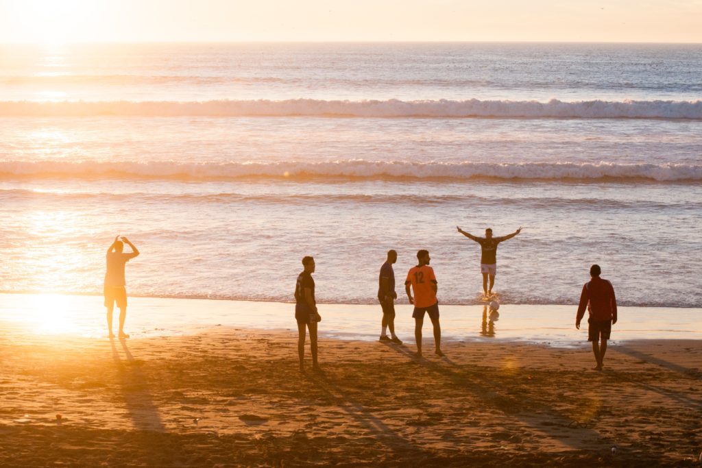 Group of people by a beach 