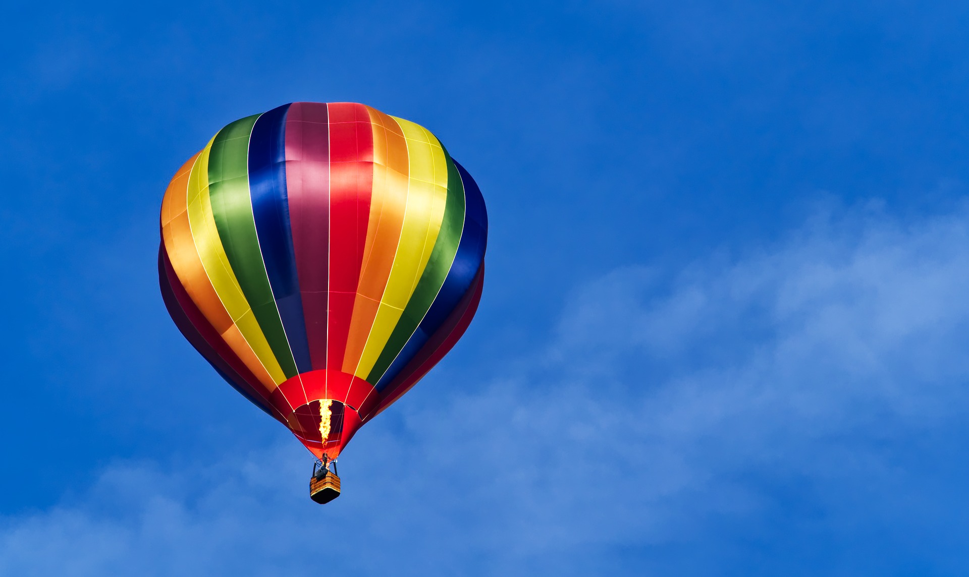 Hot air balloon with pride colors: where to travel based on pride colors